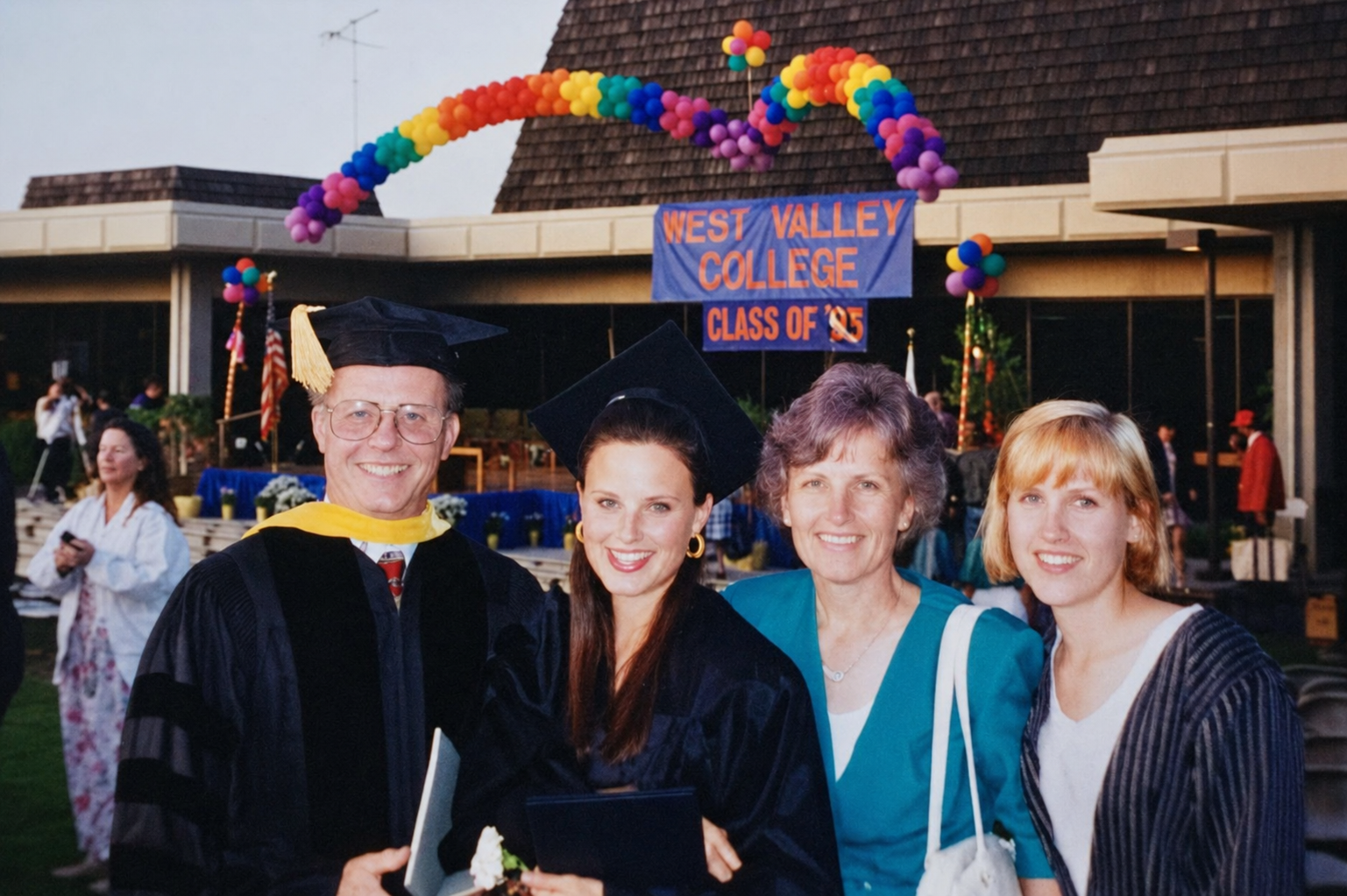 Susan Oster Fish with her late husband and two daughters at West Valley College graduation, 1993